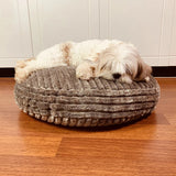 Bring calm and comfort to your furry friend with this soft calming dog bed. It's a cozy, plush and comfy dog bed that's perfect for cuddling and sleeping.