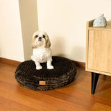 The Macaron Calming Dog Bed is designed to be soft and durable, with a high-loft memory foam that provides orthopedic support for your dog.