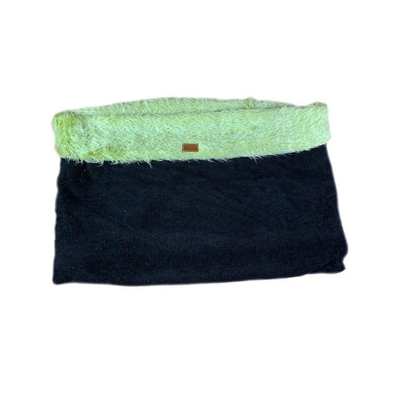 This Cozy Cave Dog Bed is the cutest thing on the market. It's made of faux fur and has a cozy cave design. Your dog will love it!