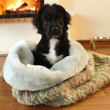 The washable, hypoallergenic bed is perfect for any dog who likes to cuddle up.