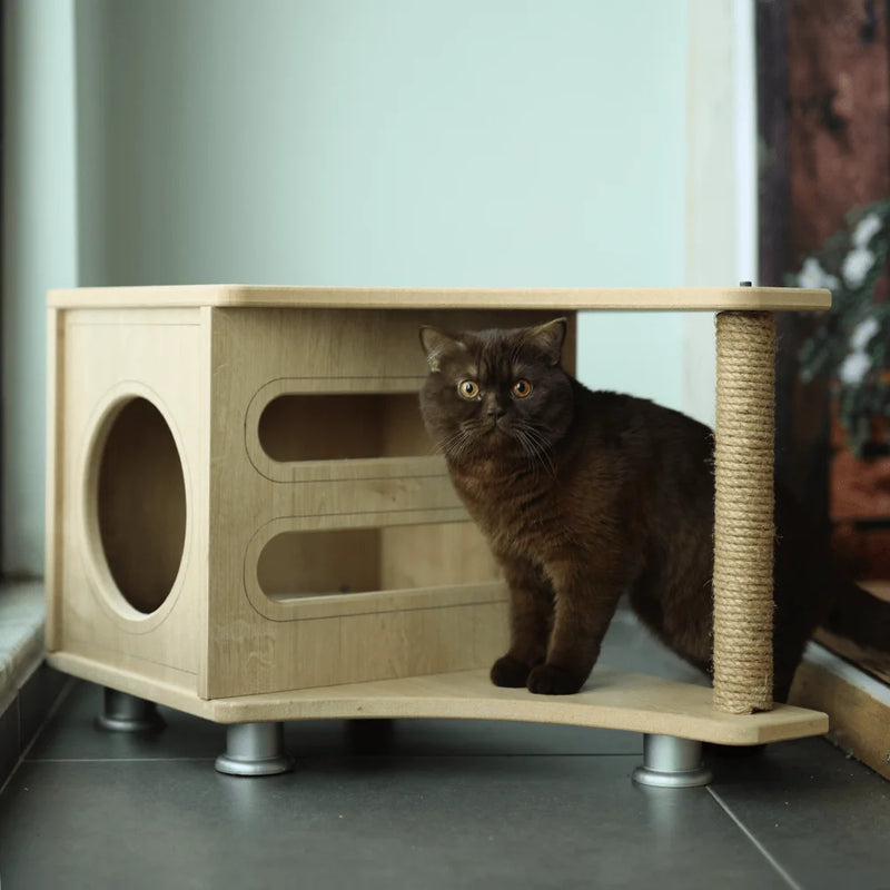 This is the perfect place for your kitty to sleep and lounge. The cat house end table is a great place for your cat to stretch out and relax. This unique design includes a scratching post, bed, and litter box.