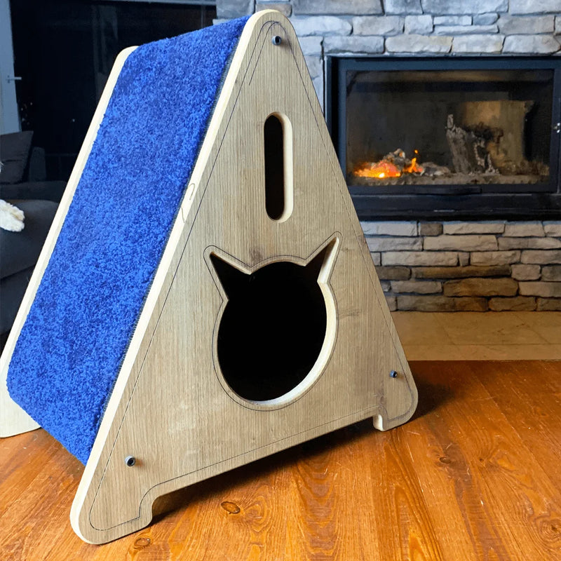 Stella Cat Teepee is a unique and stylish cat house made of sturdy, hand-crafted pine wood. It's perfect for your feline friend with its natural, earthy design.