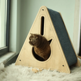 Stella Cat Teepee, a cat house made from natural wood, is the perfect place for your pet to rest and play. It is a great addition to any home or office.